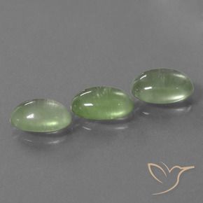 Shop natural 4.67ct Vert jaunâtre Préhnite gems, ovale, from Afrique du Sud at GemSelect. In stock, global shipping!