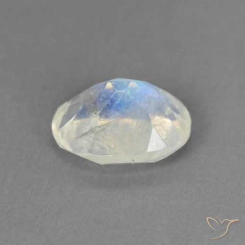 Pierre de lune arc-en-ciel Blanc bleuâtre naturelle ovale, 1.28 ct, Transparent