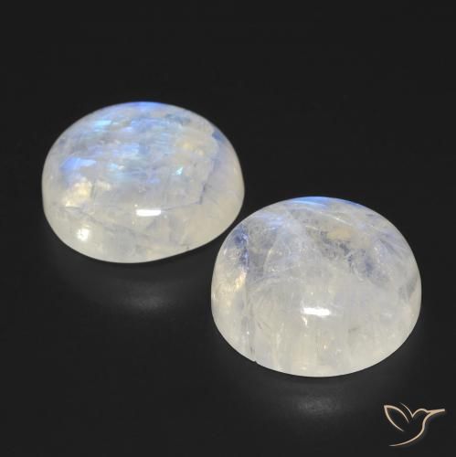 Shop natural 23.45ct Blanc bleuâtre Pierre de lune arc-en-ciel gems, Tour, from États Unis at GemSelect. In stock, global shipping!