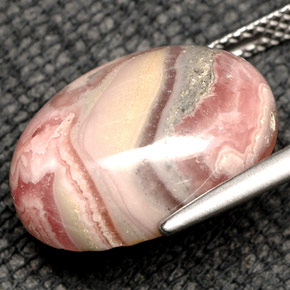 Rhodochrosite Multicolore naturelle Coupe ovale, 12.04 ct, Opaque