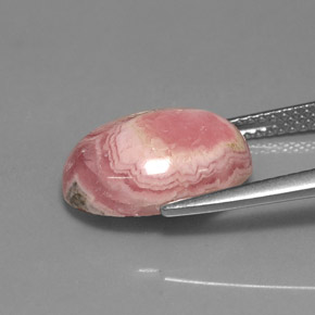 Rhodochrosite multicolore naturelle coupe ovale, 7,08 ct, opaque