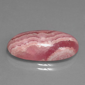 Rhodochrosite multicolore naturelle coupe ovale, 15,90 ct, opaque