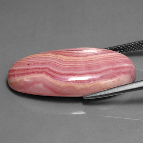 Rhodochrosite multicolore naturelle coupe ovale, 21,19 ct, opaque