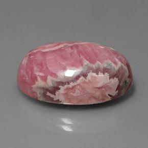 Rhodochrosite multicolore naturelle coupe ovale, 31,54 ct, opaque