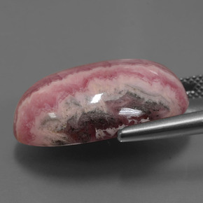 Rhodochrosite multicolore naturelle coupe ovale, 29,62 ct, opaque