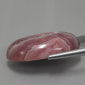 Rhodochrosite multicolore naturelle coupe ovale, 56,15 ct, opaque
