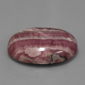 Rhodochrosite multicolore naturelle coupe ovale, 52,06 ct, opaque