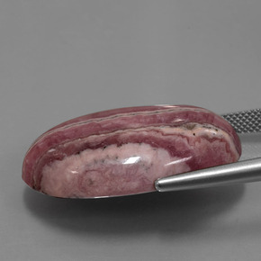 Rhodochrosite multicolore naturelle coupe ovale, 52,06 ct, opaque