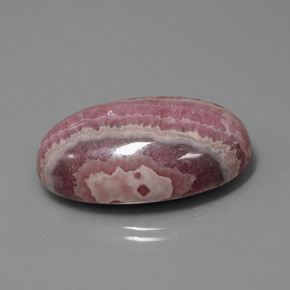Rhodochrosite Multicolore naturelle Coupe ovale, 60.60 ct, Opaque