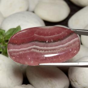 Rhodochrosite multicolore naturelle coupe ovale, 63,59 ct, translucide