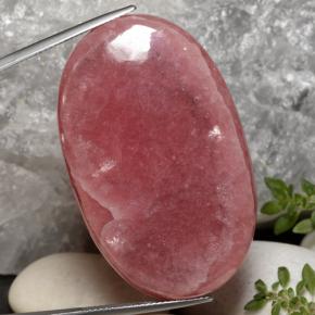 Rhodochrosite multicolore naturelle coupe ovale, 104,63 ct, translucide
