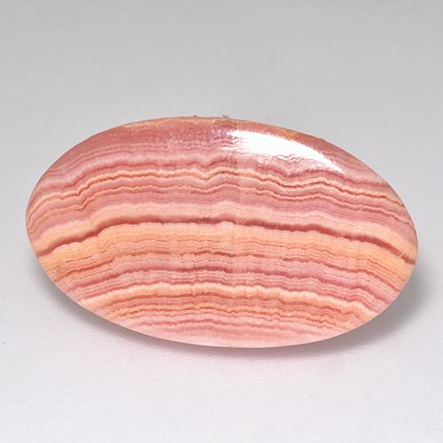 Rhodochrosite rose naturelle coupe ovale, 12,12 ct, translucide