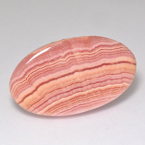 Rhodochrosite rose naturelle coupe ovale, 12,12 ct, translucide
