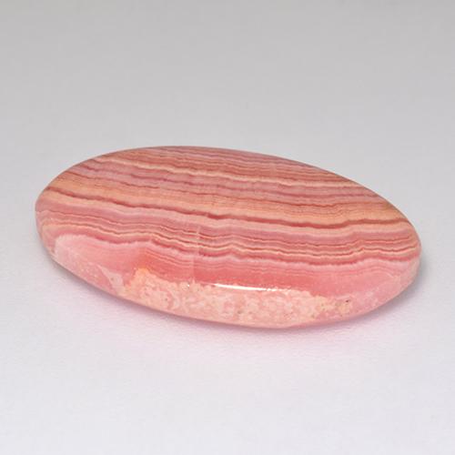 Rhodochrosite rose naturelle coupe ovale, 12,12 ct, translucide