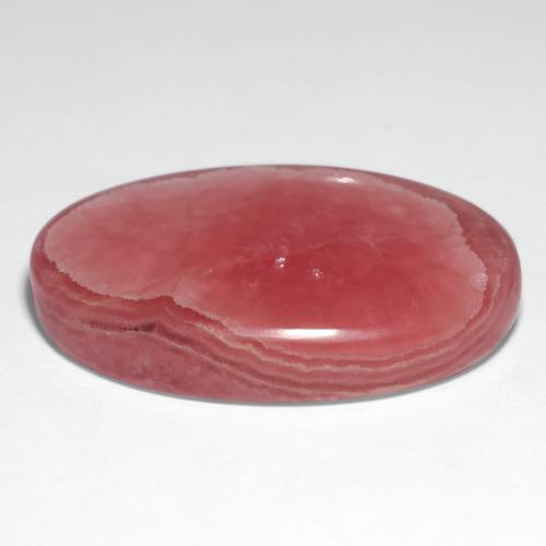 Rhodochrosite multicolore naturelle coupe ovale, 69,11 ct, translucide