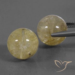 Shop natural 38.74ct Jaune clair Quartz rutile gems, Sphère / Boule, from Inde at GemSelect. In stock, global shipping!