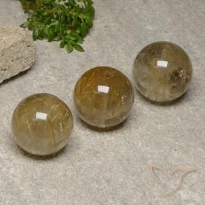 Shop natural 55.78ct Marron doré très clair Quartz rutile gems, Sphère / Boule, from Inde at GemSelect. In stock, global shipping!