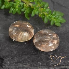 Shop natural 7.24ct Bois marron très clair Quartz rutile gems, Tour, from Inde at GemSelect. In stock, global shipping!