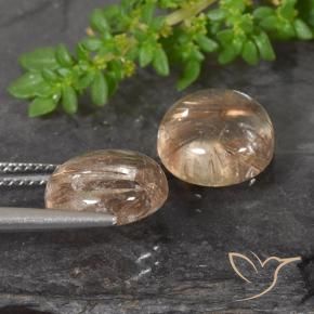 Shop natural 7.24ct Bois marron très clair Quartz rutile gems, Tour, from Inde at GemSelect. In stock, global shipping!