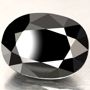 Saphir noir naturelle coupe ovale, 15,71 ct, opaque