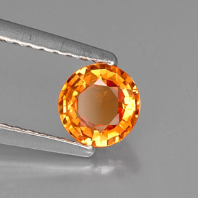 Saphir orange naturelle coupe roude, 0,60 ct, VVS