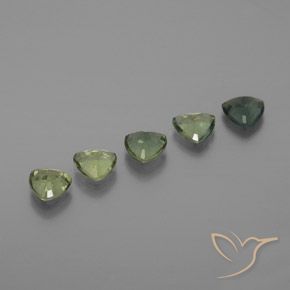 Shop natural 1.67ct Vert forêt léger Saphir gems, Trillion, from Tanzanie at GemSelect. In stock, global shipping!