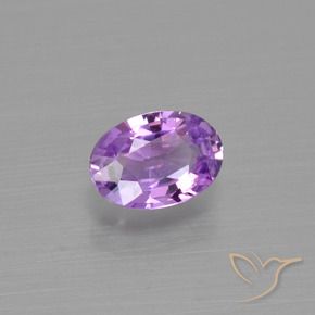 Saphir Violet violacé naturelle ovale, 0.57 ct, VS