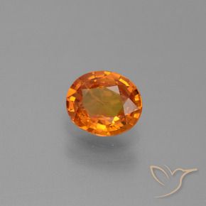 Saphir Orange foncé naturelle ovale, 0.74 ct, VS