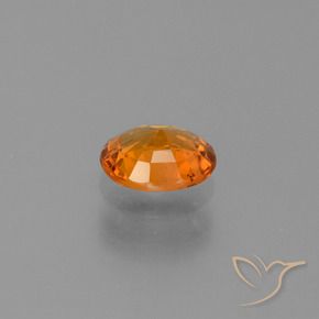 Saphir Orange foncé naturelle ovale, 0.74 ct, VS