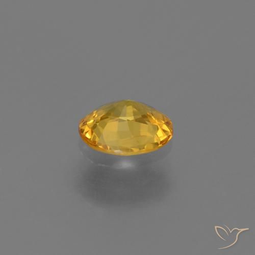 Saphir Doré foncé naturelle ovale, 0.68 ct, VS