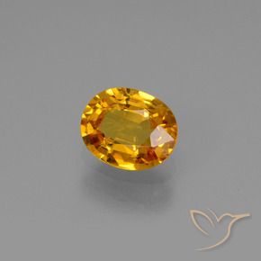 Saphir Doré-orange foncé naturelle ovale, 0.78 ct, VS