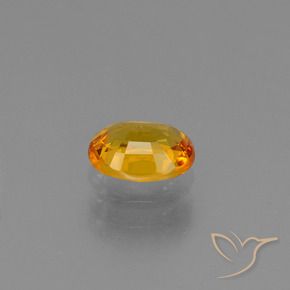 Saphir Doré-orange foncé naturelle ovale, 0.78 ct, VS