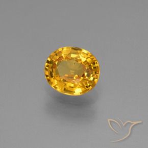 Saphir Doré foncé naturelle ovale, 0.88 ct, VS
