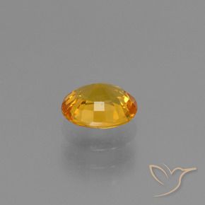 Saphir Doré foncé naturelle ovale, 0.88 ct, VS