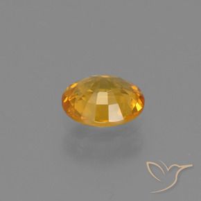 Saphir Orange doré profond naturelle ovale, 0.61 ct, VS
