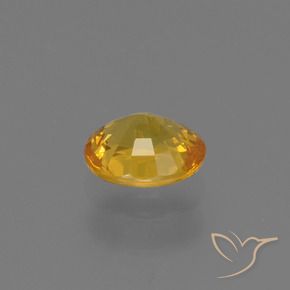 Saphir Doré foncé naturelle ovale, 0.73 ct, VS