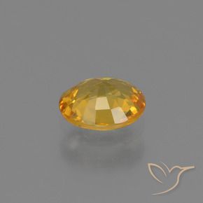 Saphir Orange doré profond naturelle ovale, 0.64 ct, VS