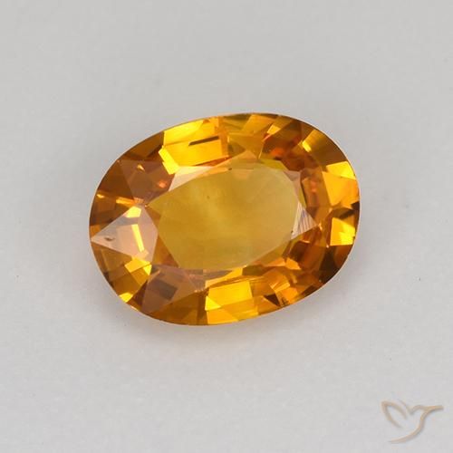 Saphir Orange moyen naturelle ovale, 0.77 ct, VS