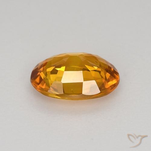 Saphir Orange moyen naturelle ovale, 0.77 ct, VS