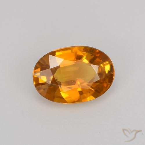 Saphir Or orange foncé naturelle ovale, 0.72 ct, VVS