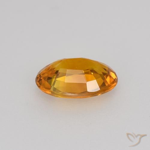 Saphir Or orange foncé naturelle ovale, 0.72 ct, VVS