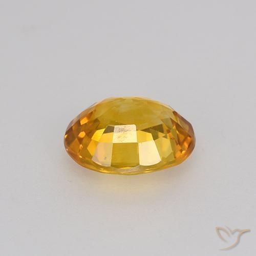 Saphir Or-orange moyen naturelle ovale, 0.84 ct, VS