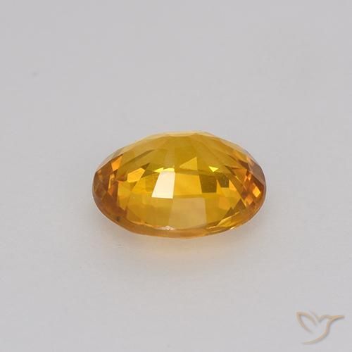 Saphir Doré-orange foncé naturelle ovale, 0.75 ct, VVS-VS