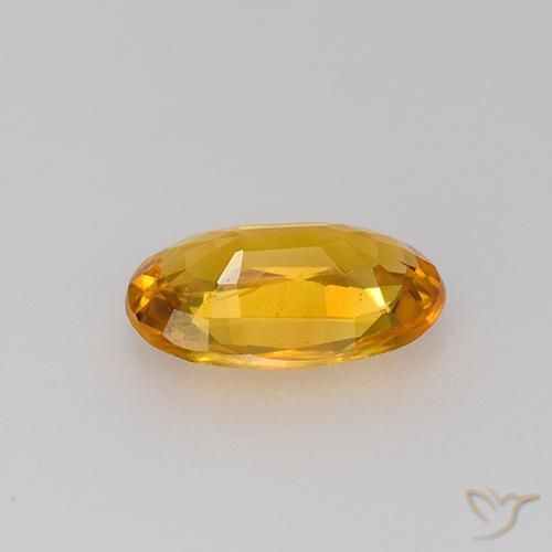 Saphir Doré-orange foncé naturelle ovale, 0.83 ct, VVS