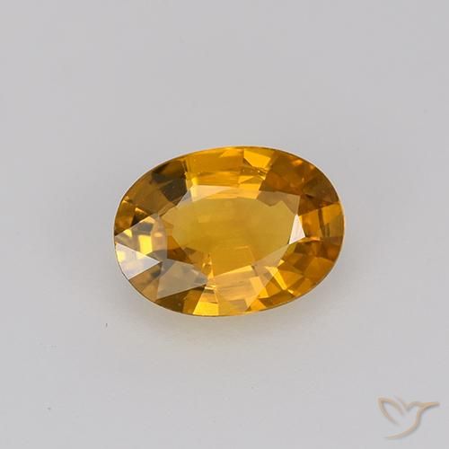 Saphir Or orange foncé naturelle ovale, 0.71 ct, VVS