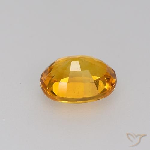 Saphir Or orange foncé naturelle ovale, 0.81 ct, VVS