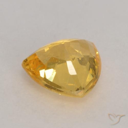 Saphir Doré naturelle Trillion, 0.63 ct, VS