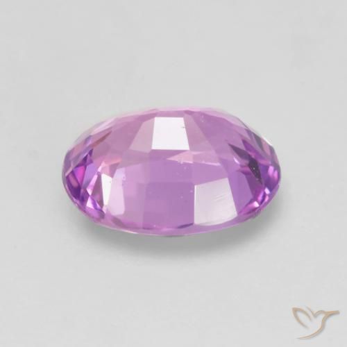 Saphir Pourpre rosâtre profond naturelle ovale, 0.65 ct, VVS-VS