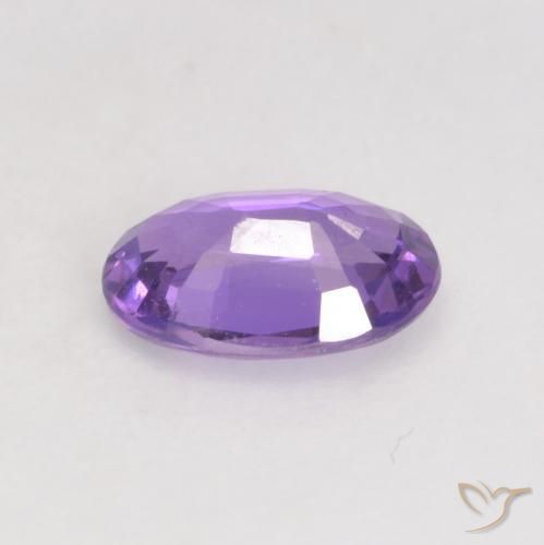 Saphir Raisin violet vif naturelle ovale, 0.49 ct, VS