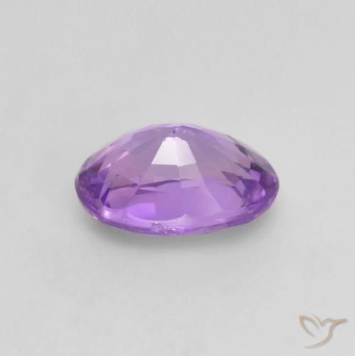 Saphir Violet rose vif naturelle ovale, 0.64 ct, VS